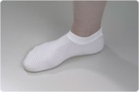 Photo of a foot wearing the Nonskid shower slipper