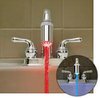 Photograph shows water flowing from faucet with red light through stream. Inset photo with blue.